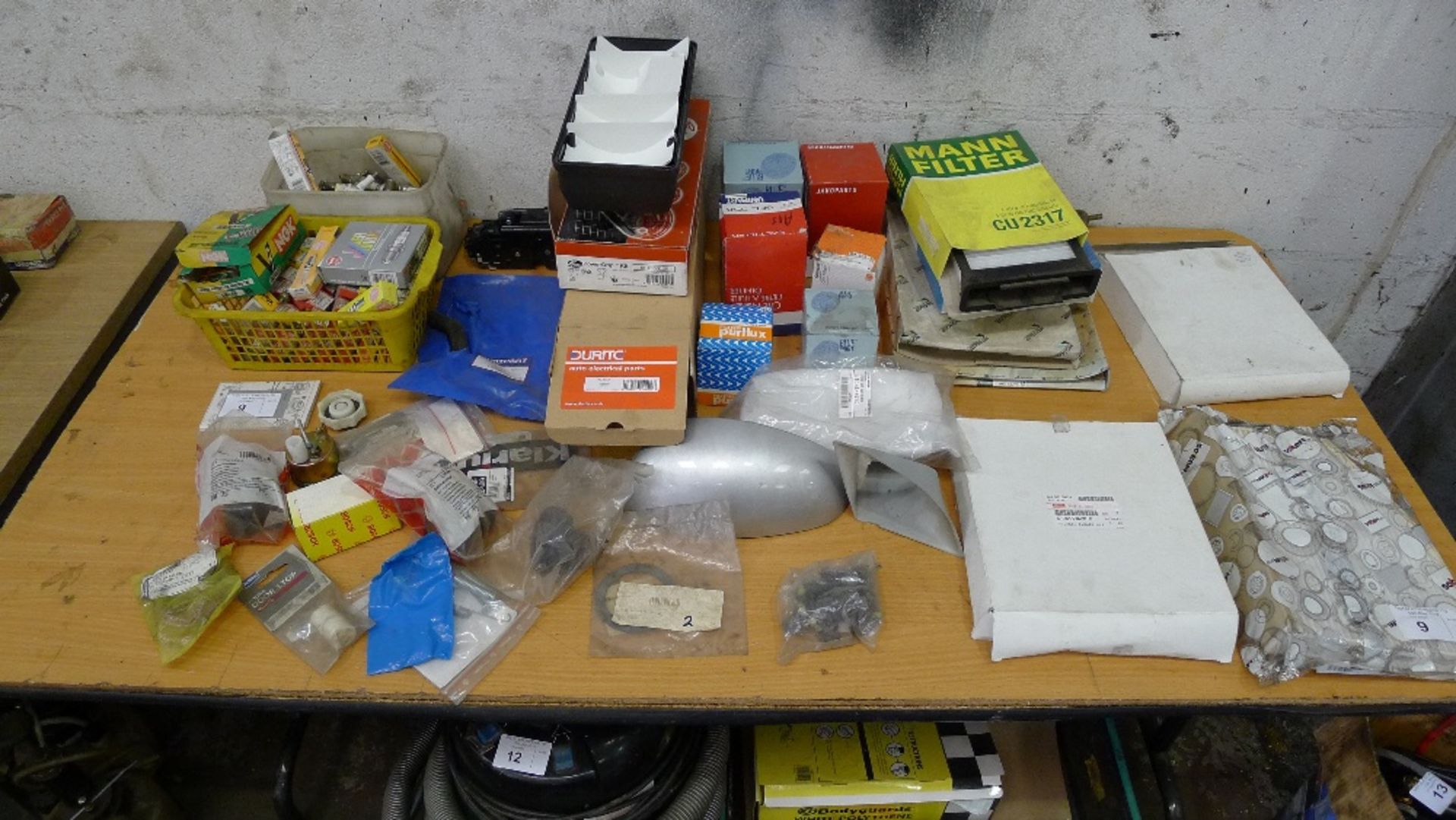 A quantity of various auto spares including spark plugs etc. Not practical to list in detail, please