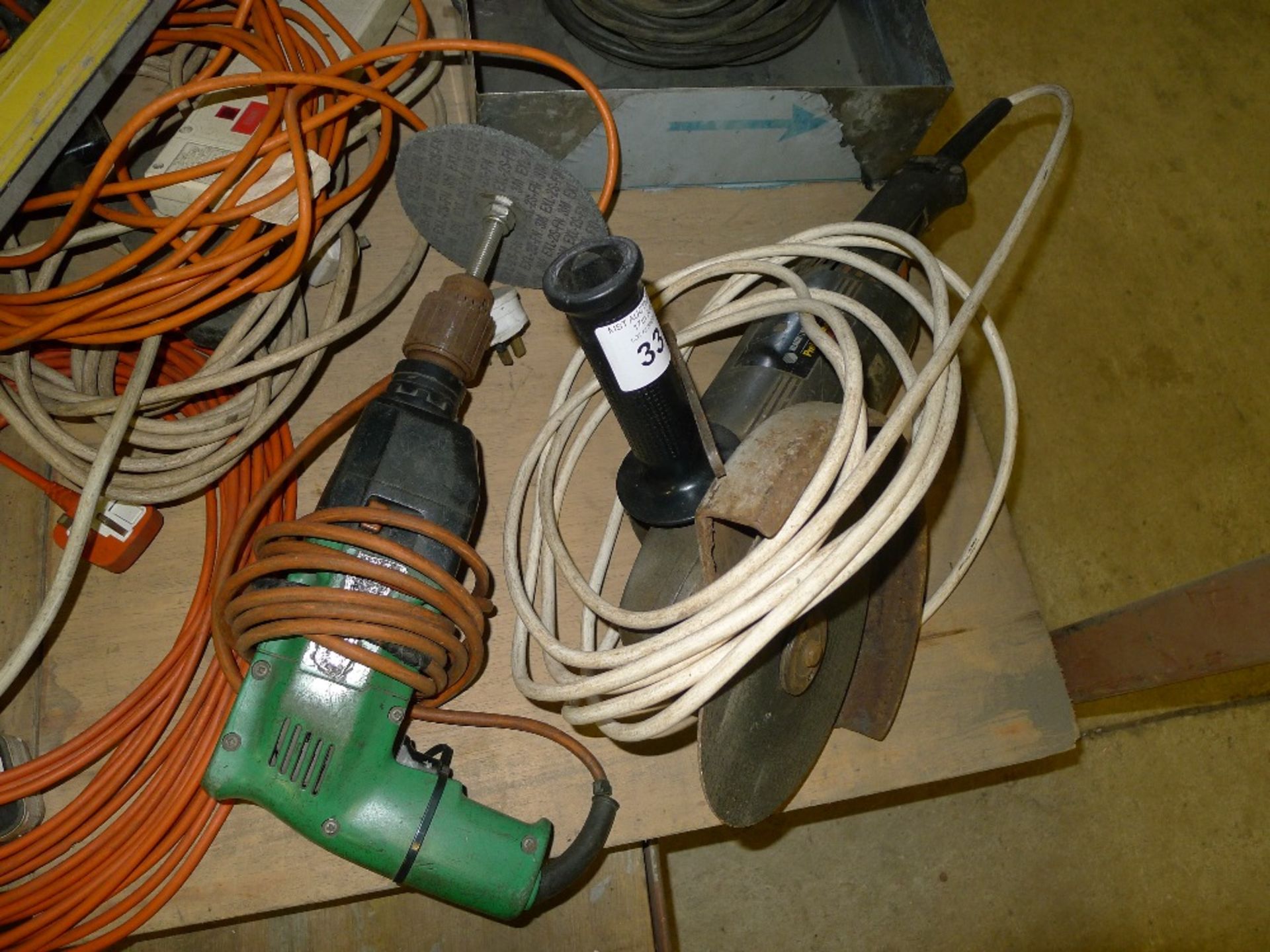 1 angle grinder by Black and Decker, 1 drill by Hitachi and a quantity of various extension leads - Image 2 of 5