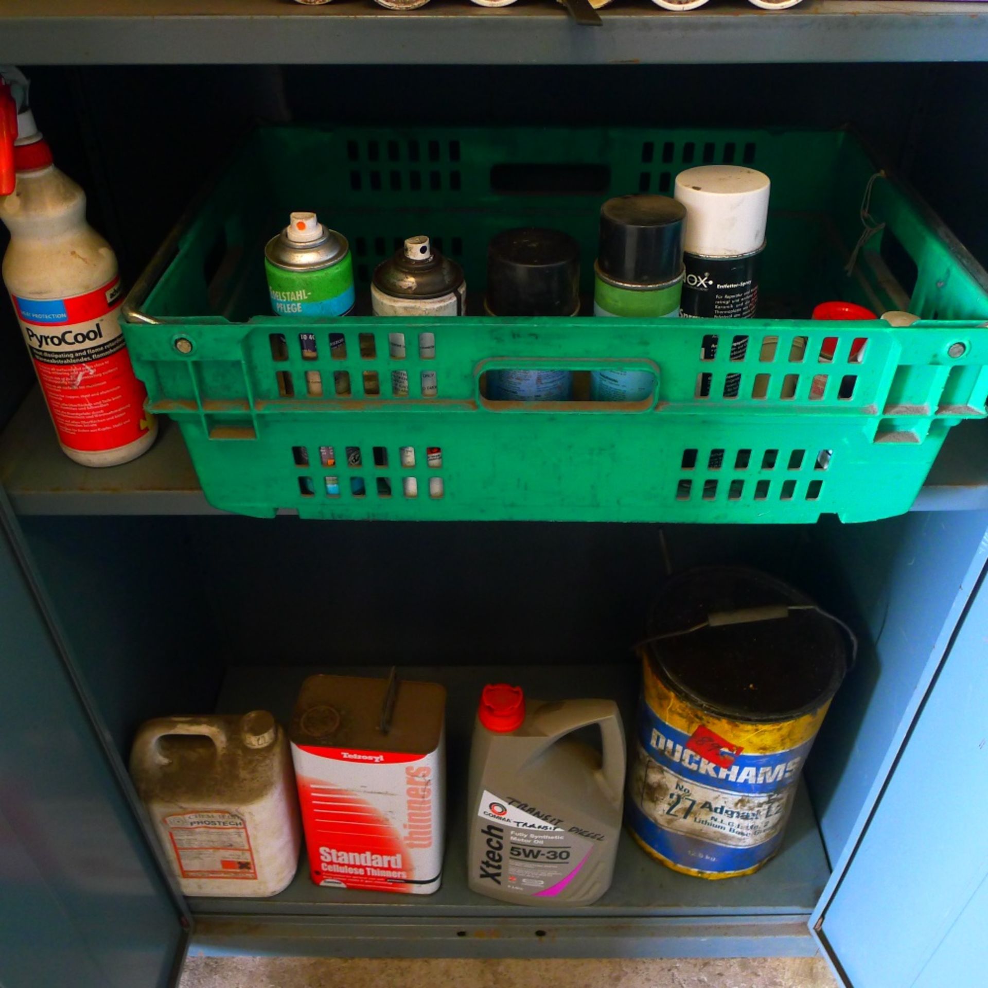 2 grey metal storage cabinets each approx 6ft x 3ft containing various part used drums of oil, - Image 5 of 5