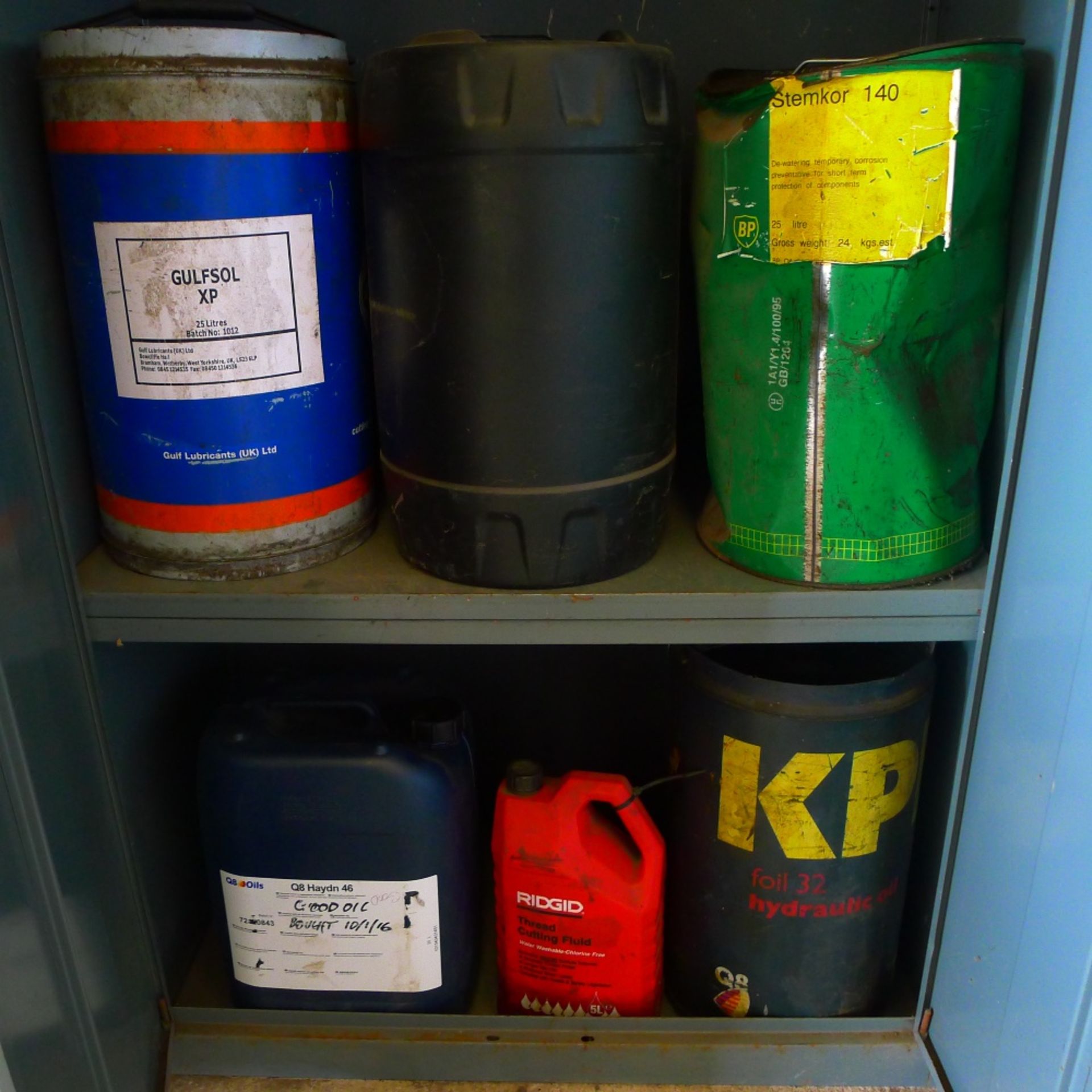 2 grey metal storage cabinets each approx 6ft x 3ft containing various part used drums of oil, - Image 3 of 5