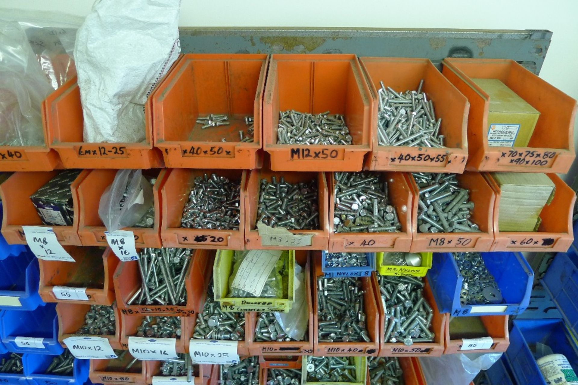 A quantity of plastic Lin type bins hanging on a free standing rack containing a large quantity of - Image 2 of 5