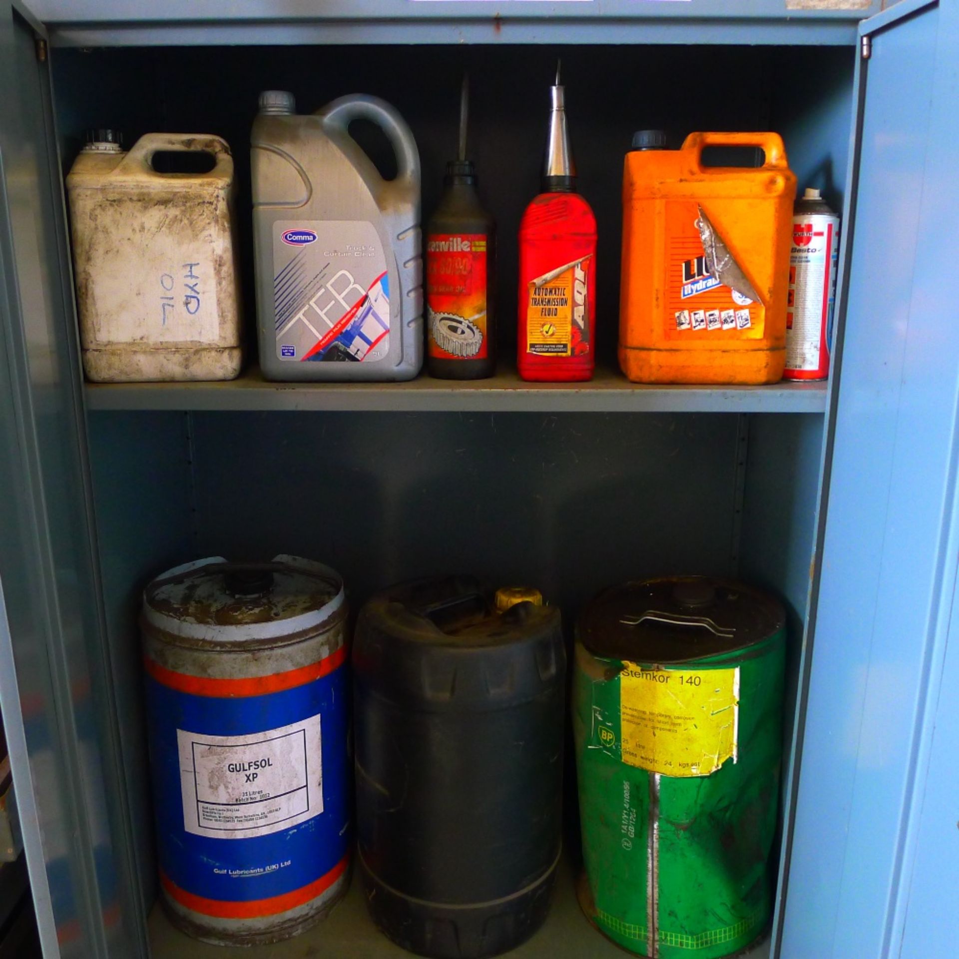 2 grey metal storage cabinets each approx 6ft x 3ft containing various part used drums of oil, - Image 2 of 5