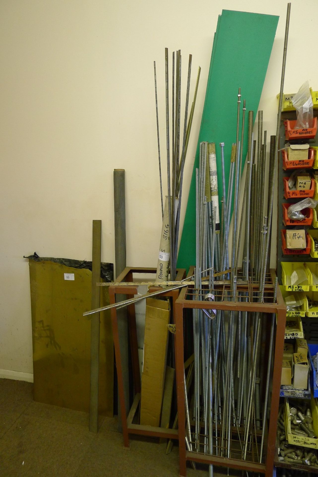 A quantity of various items including a sheet of brass, threaded bar, 2 stands etc