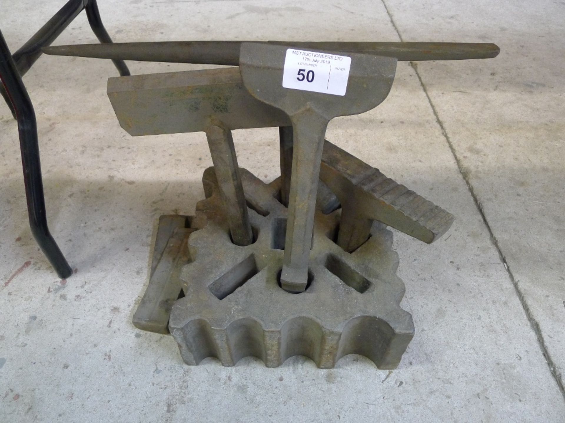 1 Blacksmiths swage block, 4 swage type tools and 2 wedges