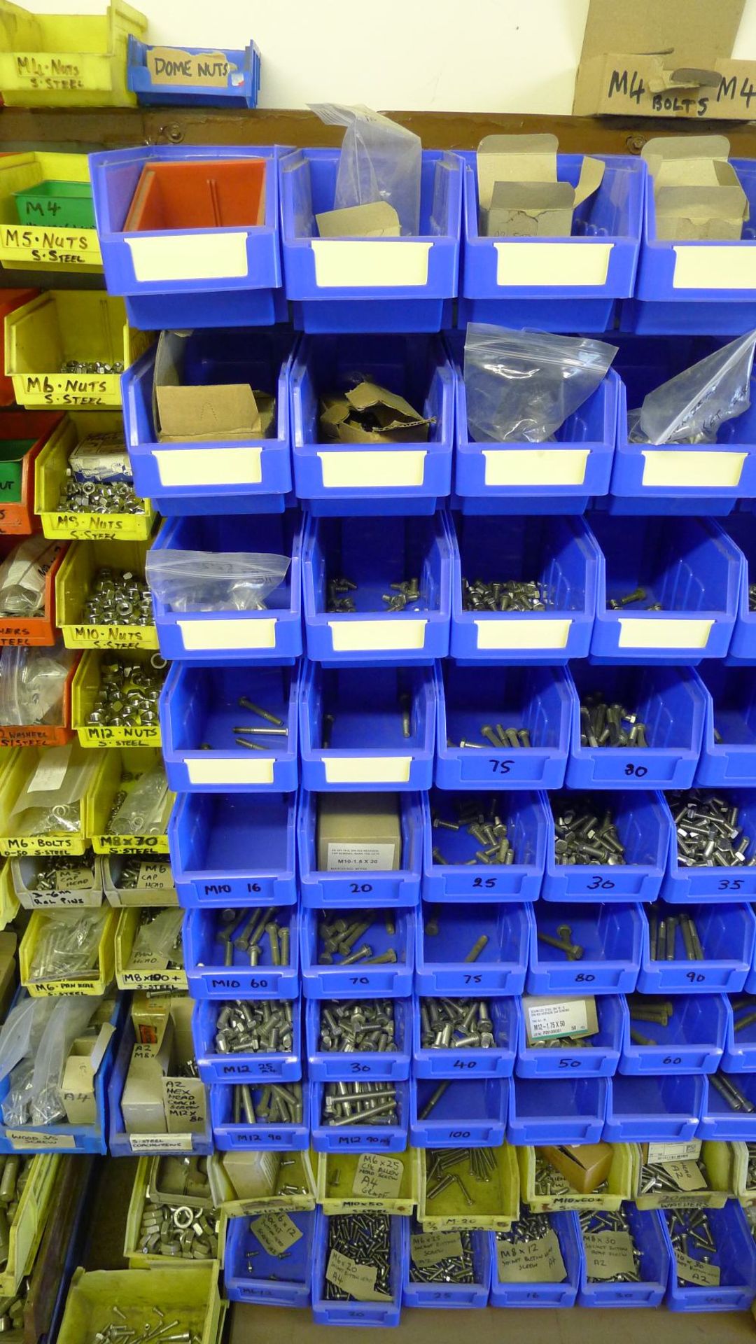 A quantity of plastic Lin type bins hanging on a free standing rack containing a large quantity of - Image 4 of 5