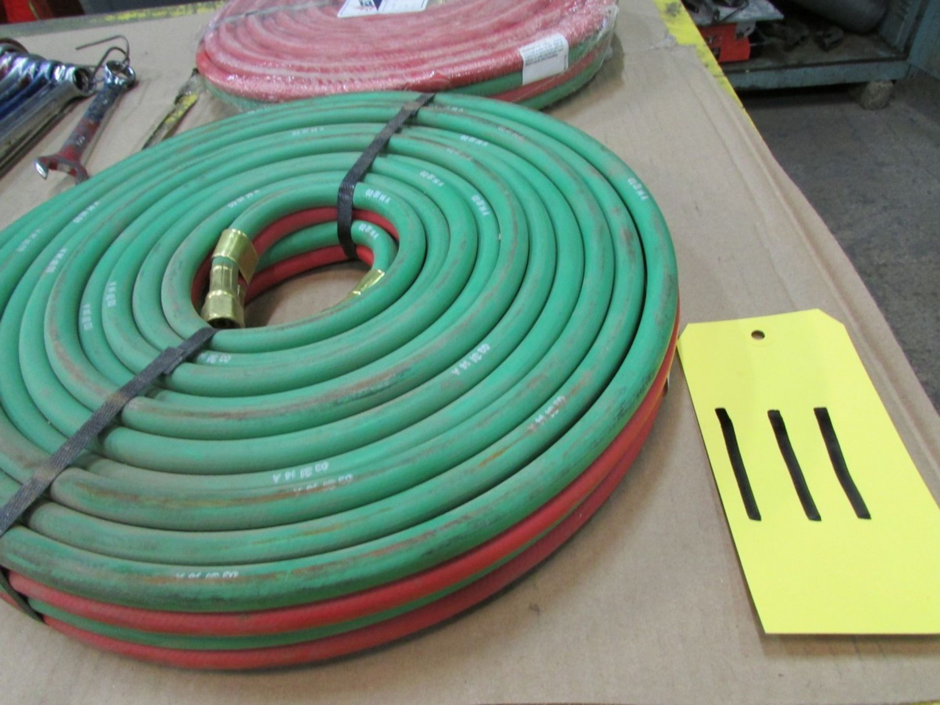 Two - 50' unused oxyacetylene gas line