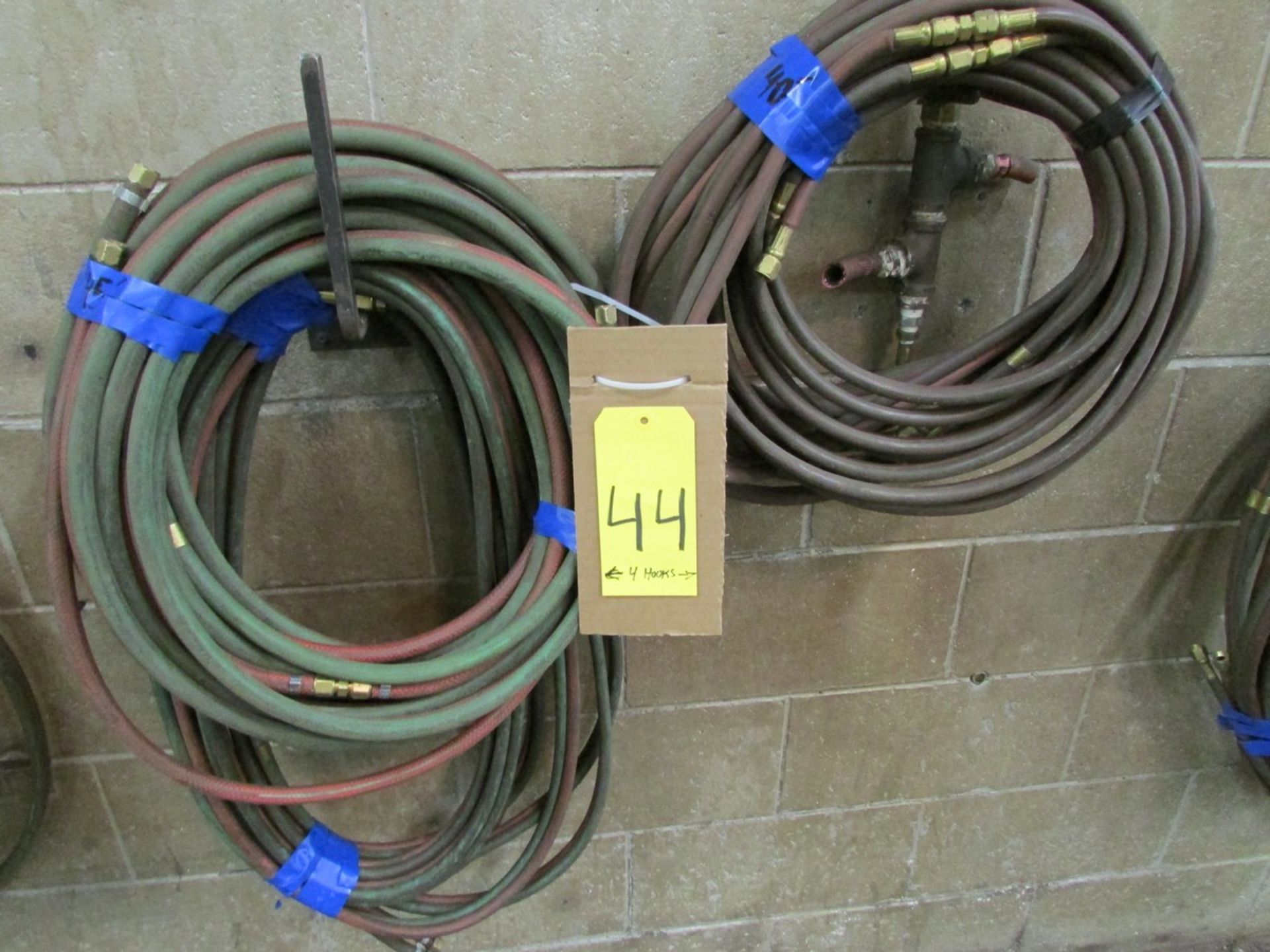 Multiple lengths of twin acetylene welding hose, over 300' in total