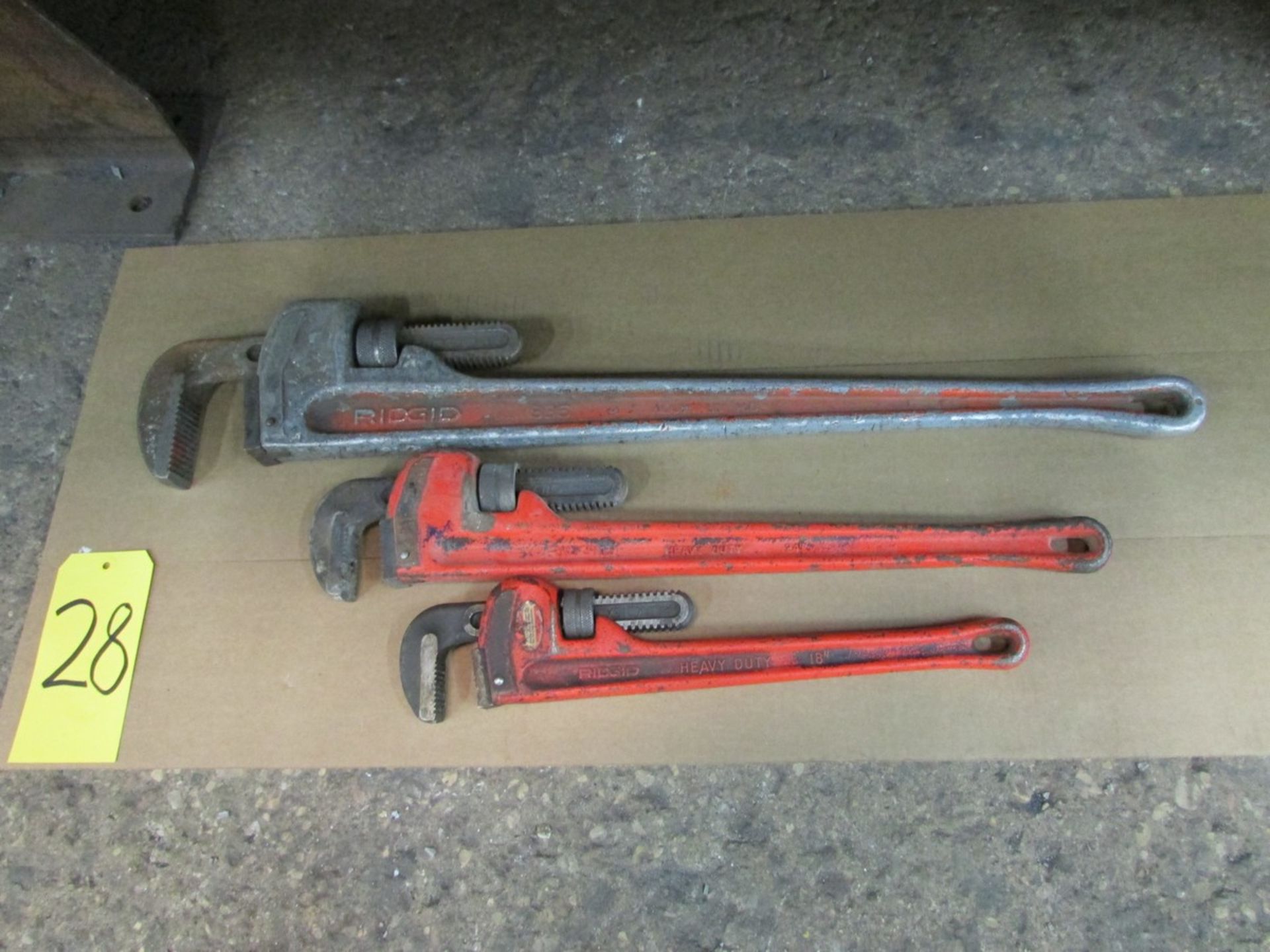 Three pipe wrenches (small, medium & large)