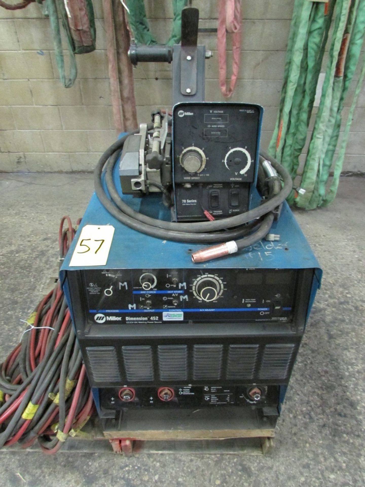 Miller Dimension 452 welder, s/n LF390857C c/w 70 Series 24V wire feed welding gun w/ generous