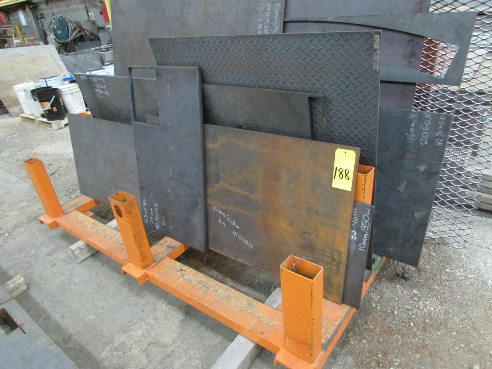 Material rack c/w plate steel and large pieces of heavy plate