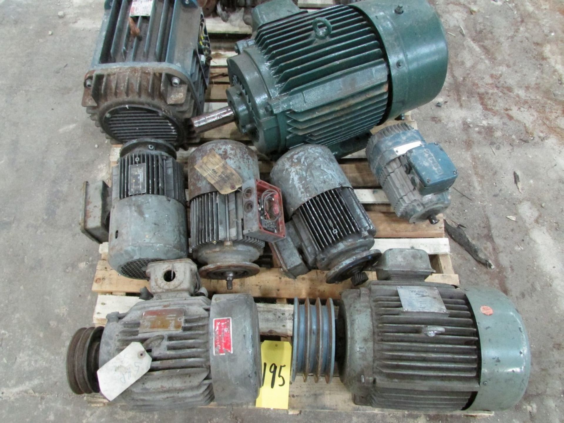 Three skids of various sized elec. motors