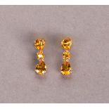 Paar Citrin-Pendeloques. Goldgelbe Citrine ca. 3,46 ct. Fassung 14 ct. Roségold mit Steckbrisur