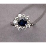 Saphir-/Brillantring. Blauer Saphir ca. 1,44 ct. Mit ca. 0,90 ct. Brillanten karmosiert. Fassung