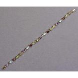 Farbstein-Armband. Amethyste, Peridots, Citrine, Aquamarine, Granate in 10 ct. GG-Fassung. L 19 cm