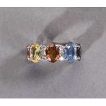 Außergewöhnlicher Memoryring. Saphire in verschiedenen Farben ca. 9,34 ct. Brillanten ca. 1,06 ct.