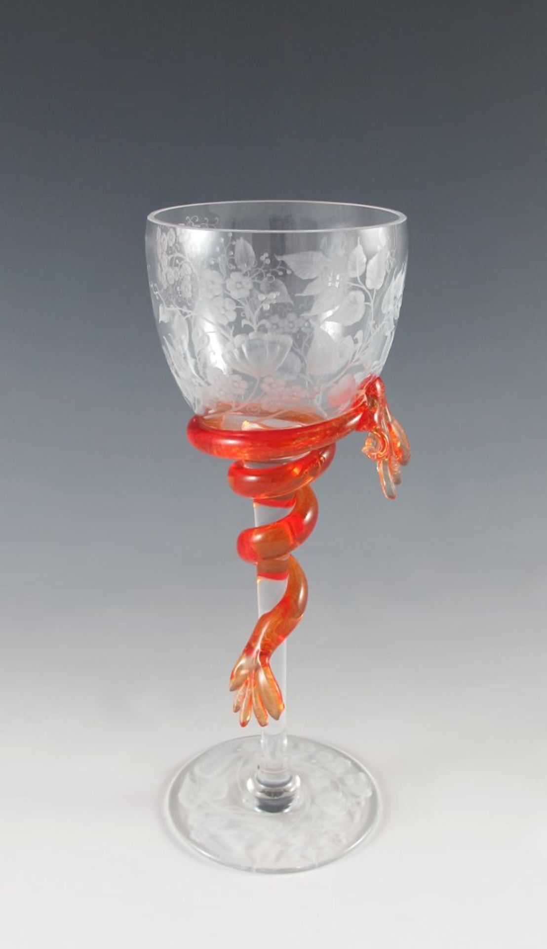 Stielglas. Farbloses Glas mit orangeroter Aufschmelzung. Feine Diamantgravur. Bez. J(osef)