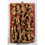 Figurenreiche Kassettenschnitzerei mit Adorationsszenen. Vergoldet. China, um 1900. 38 x 23 cm- - -