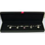 18ct White Gold Signed Theo Fennell 5 Charm Diamond Set Bracelet