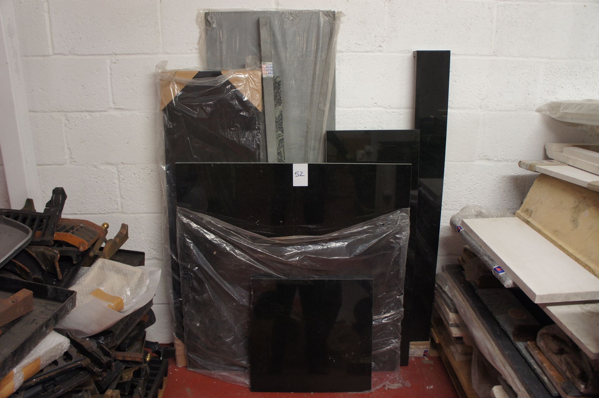 A quantity of granite hearths and fire inserts