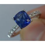 Sapphire and Diamond Cluster ring in 18ct Gold