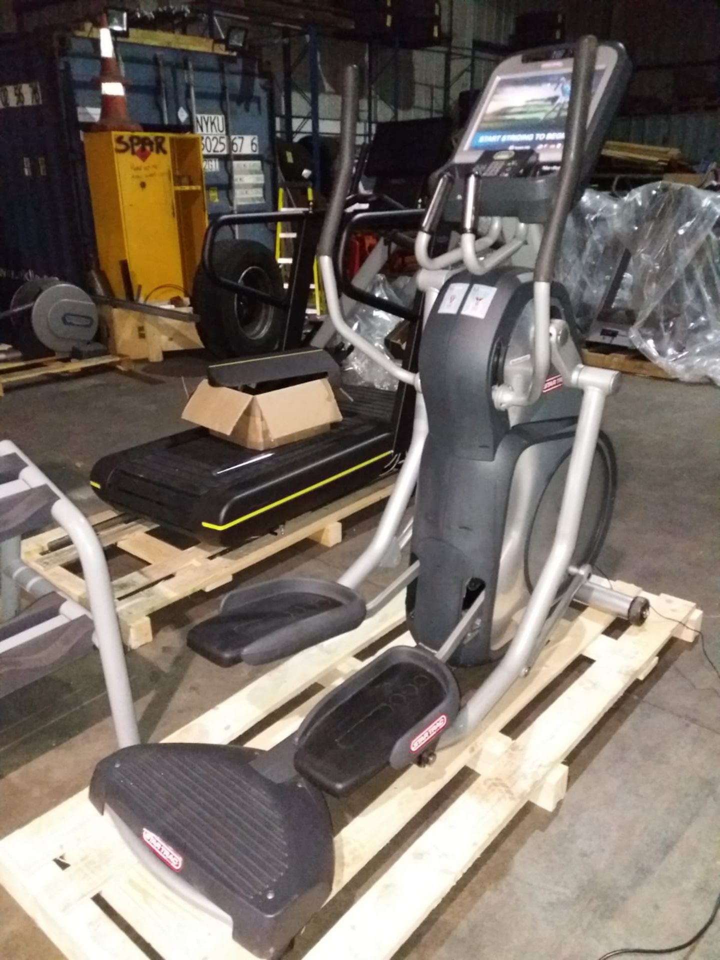 Star Trac LCD cross trainer.