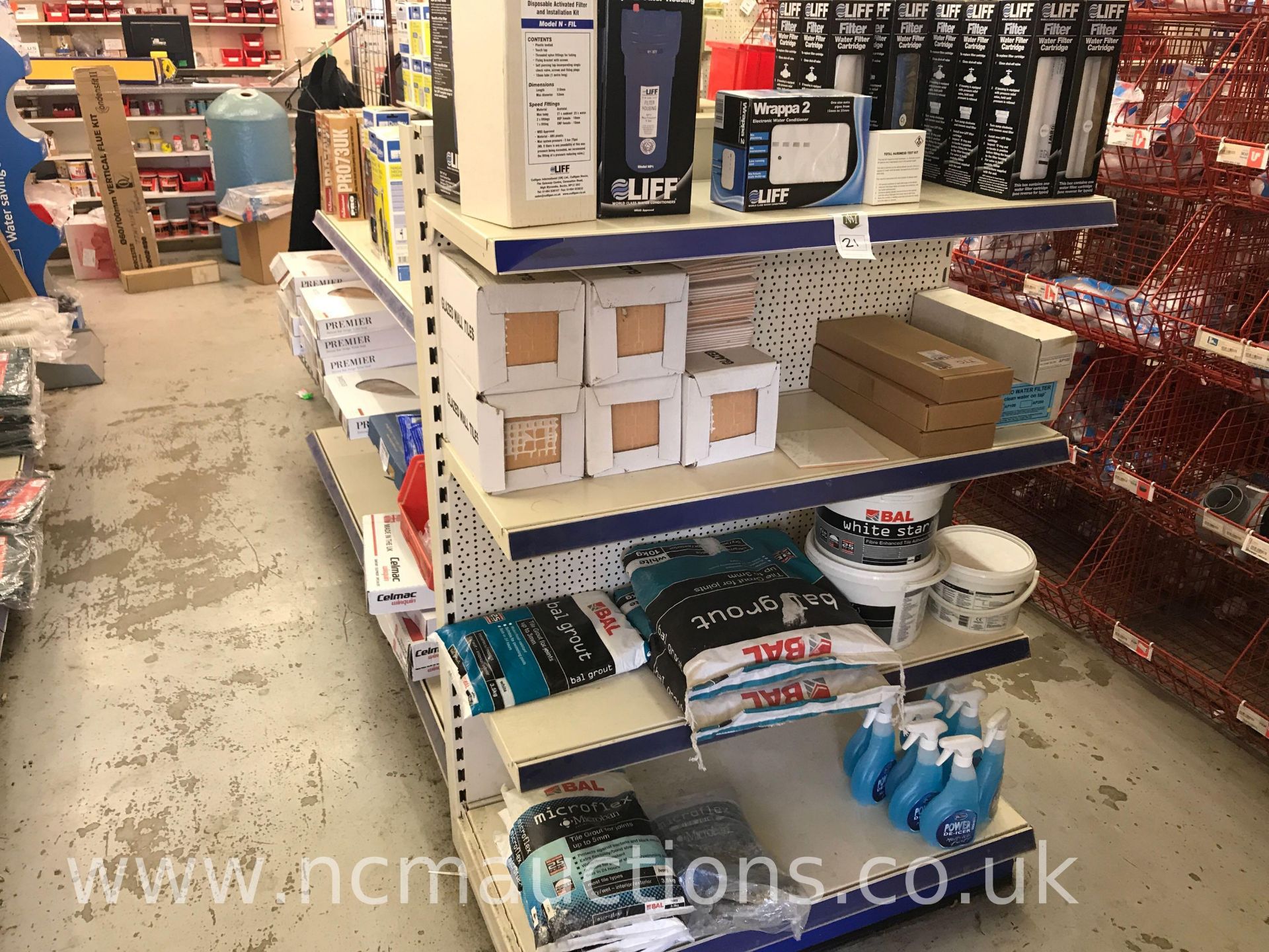 Double sided display rack with plumbing products - Image 2 of 12