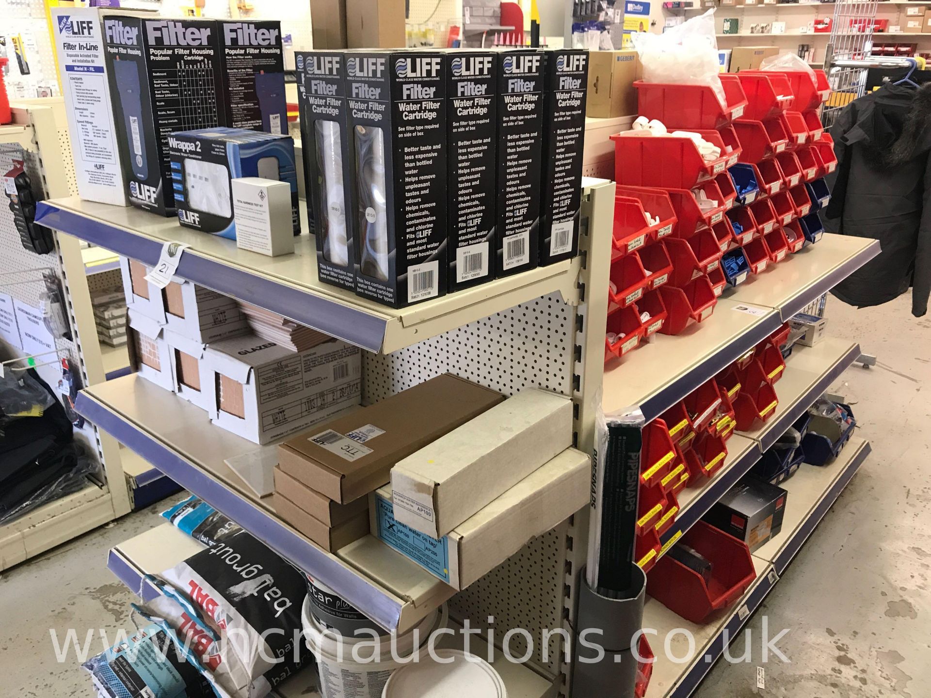 Double sided display rack with plumbing products - Image 3 of 12