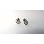 Stamped 750 Diamond Swirl Stud Earrings