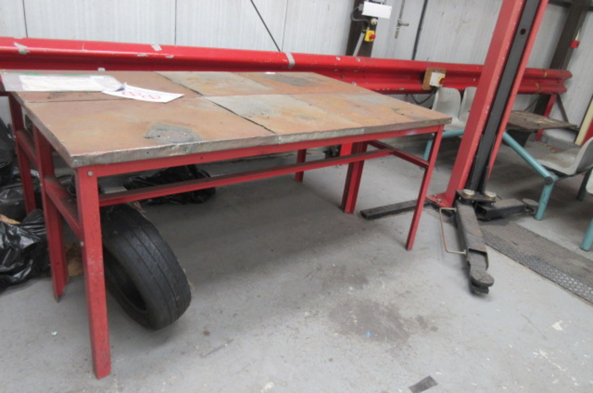 Two steel work benches