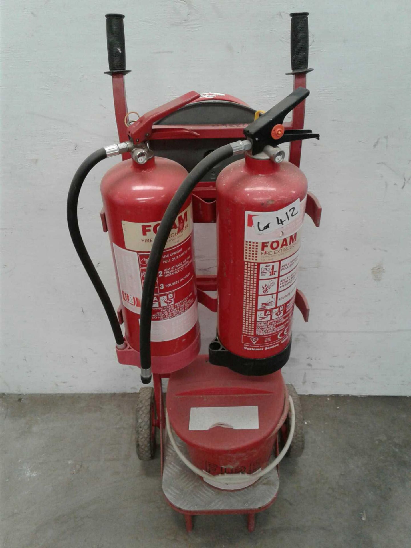 Fire truck with two fire extinguishers