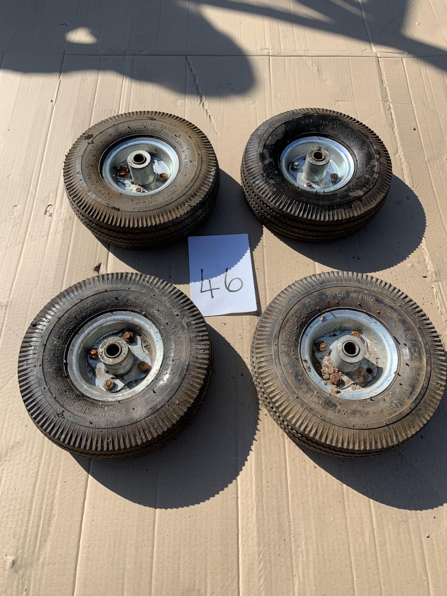 4 x small trolley truck wheels and tyres