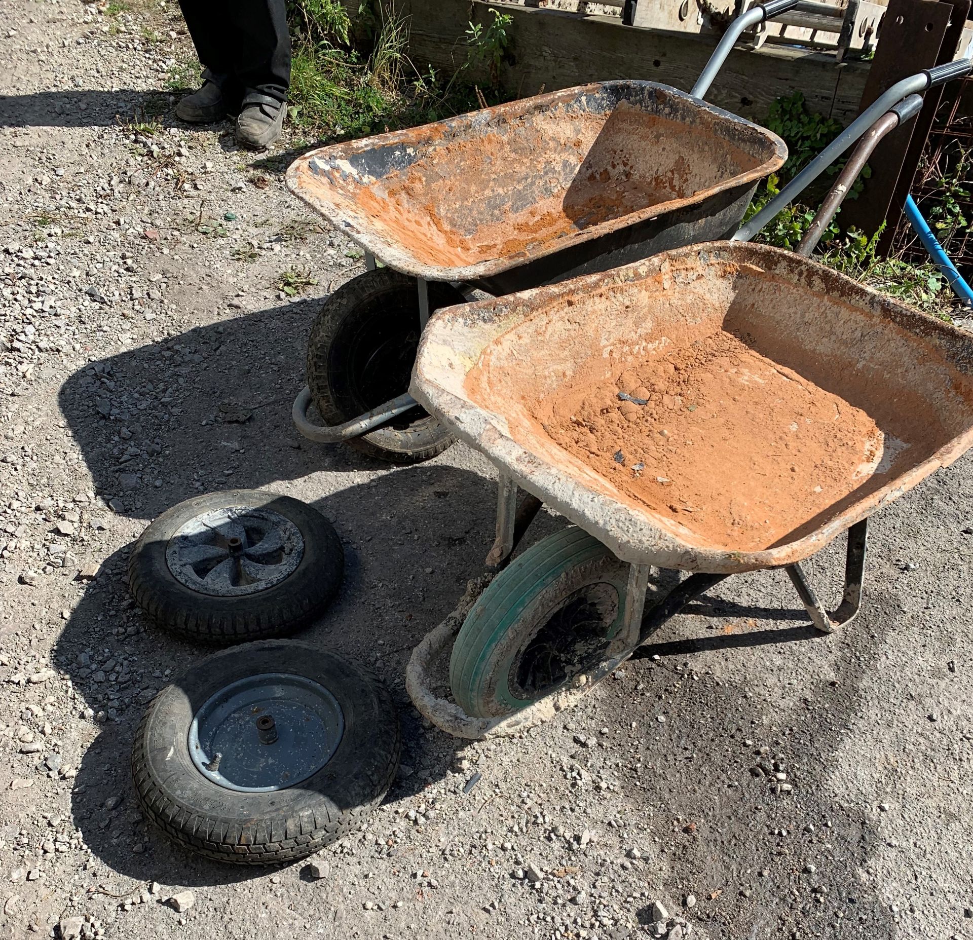 2 Wheelbarrows with spare wheels