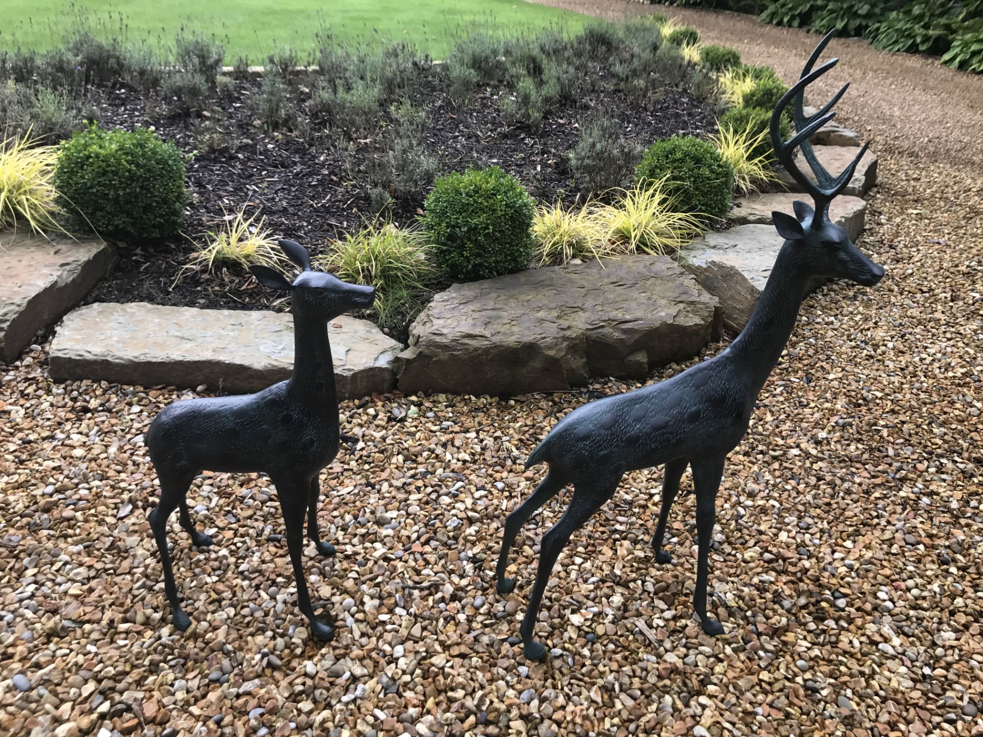 PAIR CAST METAL DEERS IN GREEN BRONZE FINISH