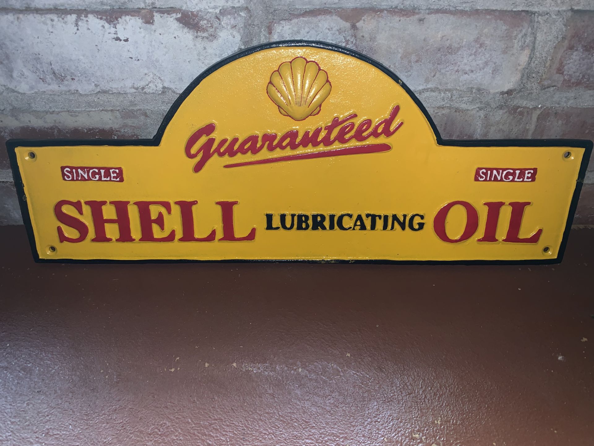 CAST IRON SHELL OIL SIGN