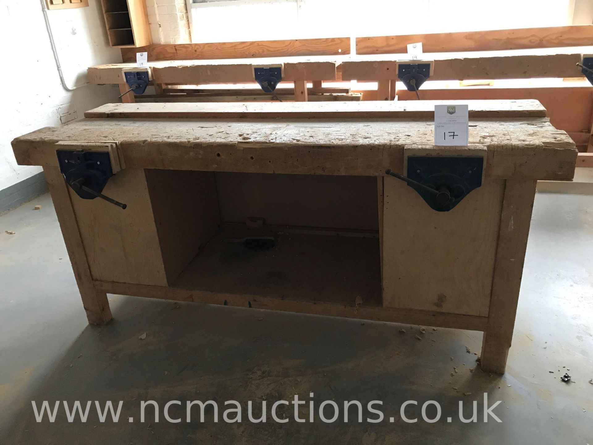 Single sided carpenters bench with vices