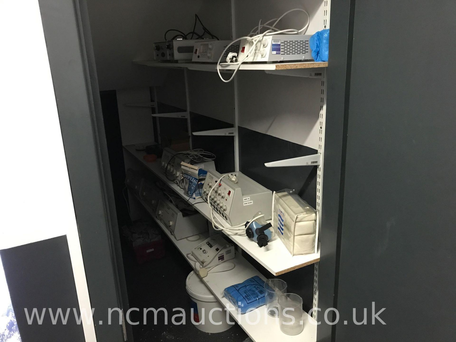 Loose and removable contents of Beauty salon storage cupboard