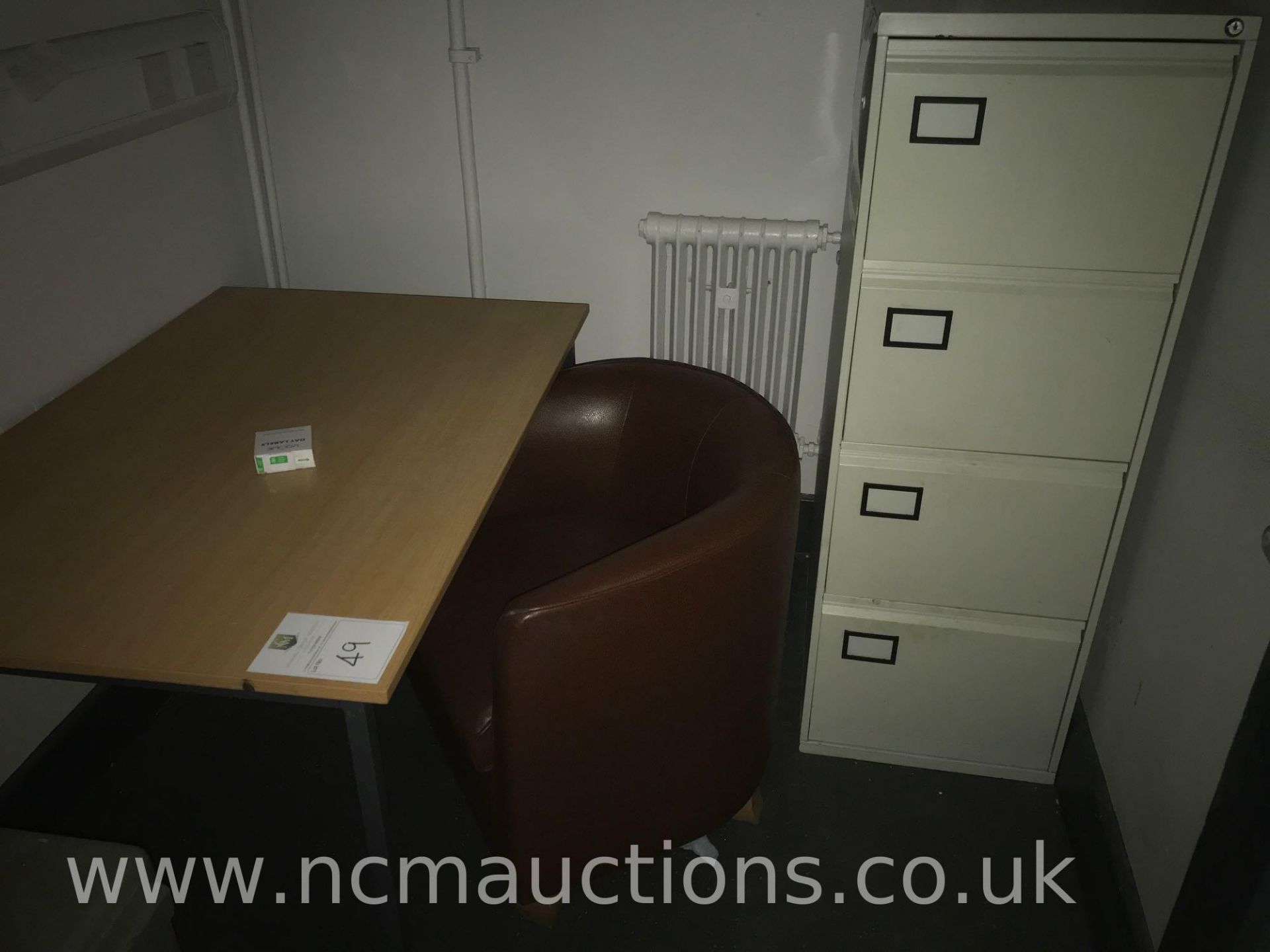 Dining table and chairs plus extra chairs and a filing cabinet