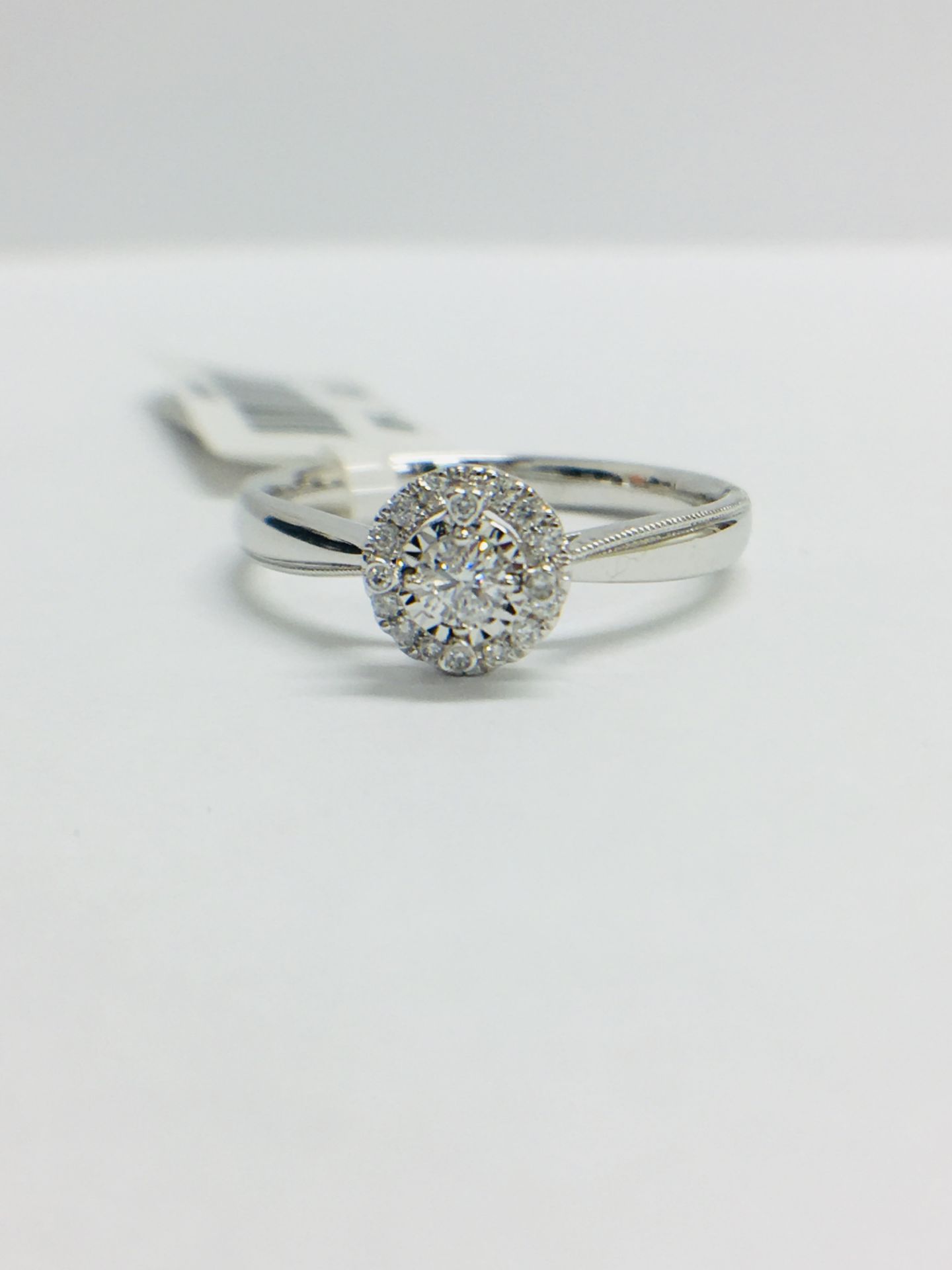 9CT White Gold diamond Solitaire illusion set ring with a millegrain edge shank - Image 10 of 11