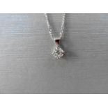 0.50ct diamond solitaire pendant set in 18ct gold. Off set 4 claw setting