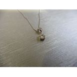 0.15ct diamond solitaire pendant set in 18ct gold. 4 claw setting
