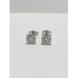9ct white gold cluster style solitaire earrings