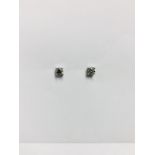 0.30ct Solitaire diamond stud earrings set with brilliant cut diamonds