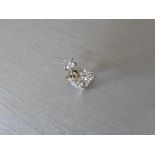 0.75ct Solitaire diamond stud earrings set with brilliant cut diamonds