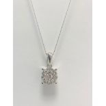 9ct white Gold illusion style solitaire diamond pendant and necklace