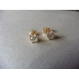 1.00ct Solitaire diamond stud earrings set with brilliant cut diamonds