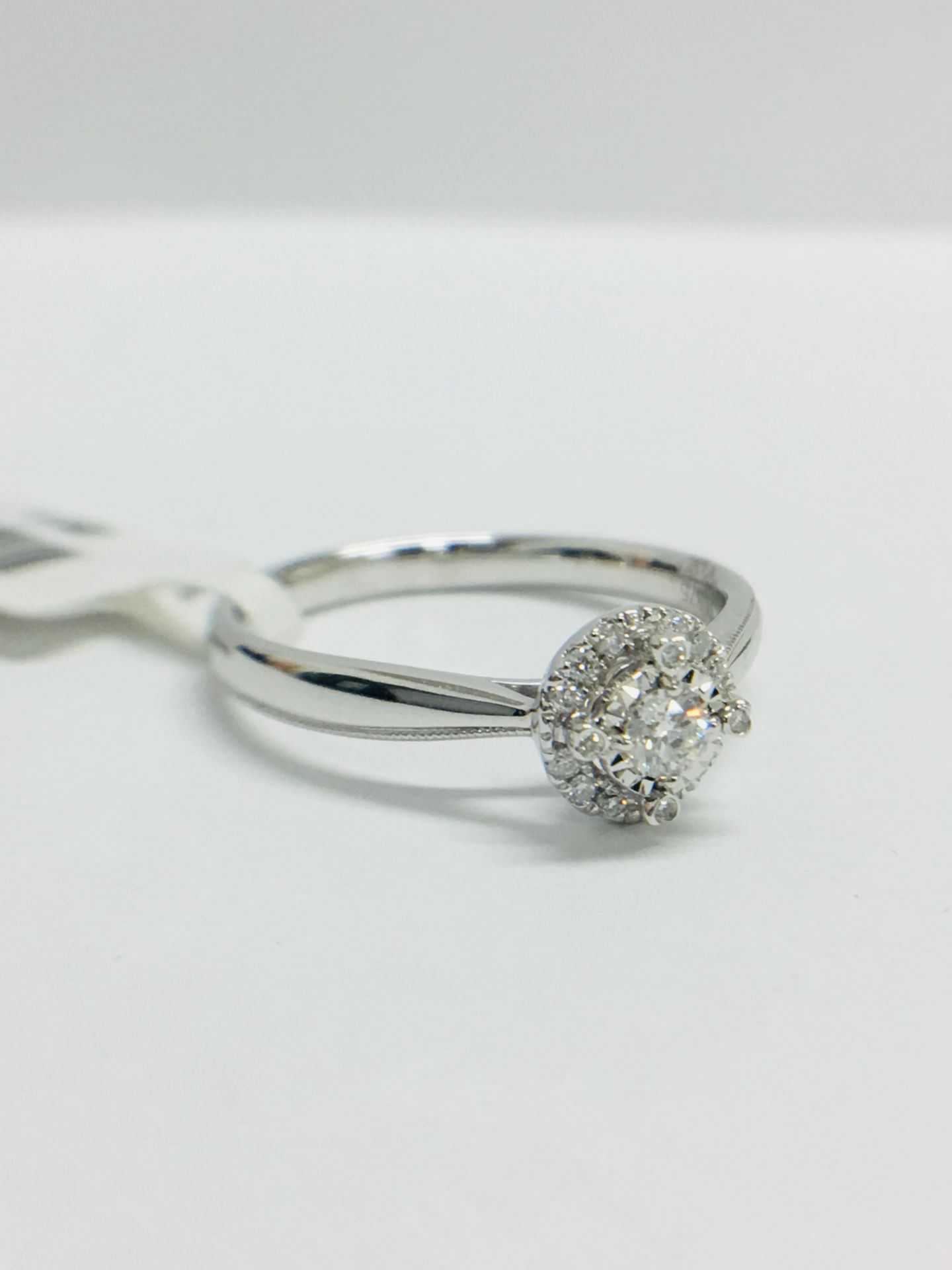 9CT White Gold diamond Solitaire illusion set ring with a millegrain edge shank - Image 9 of 11