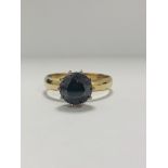 18ct Yellow Gold Diamond ring featuring centre, round brilliant cut, deep orangey brown Diamond (3.3