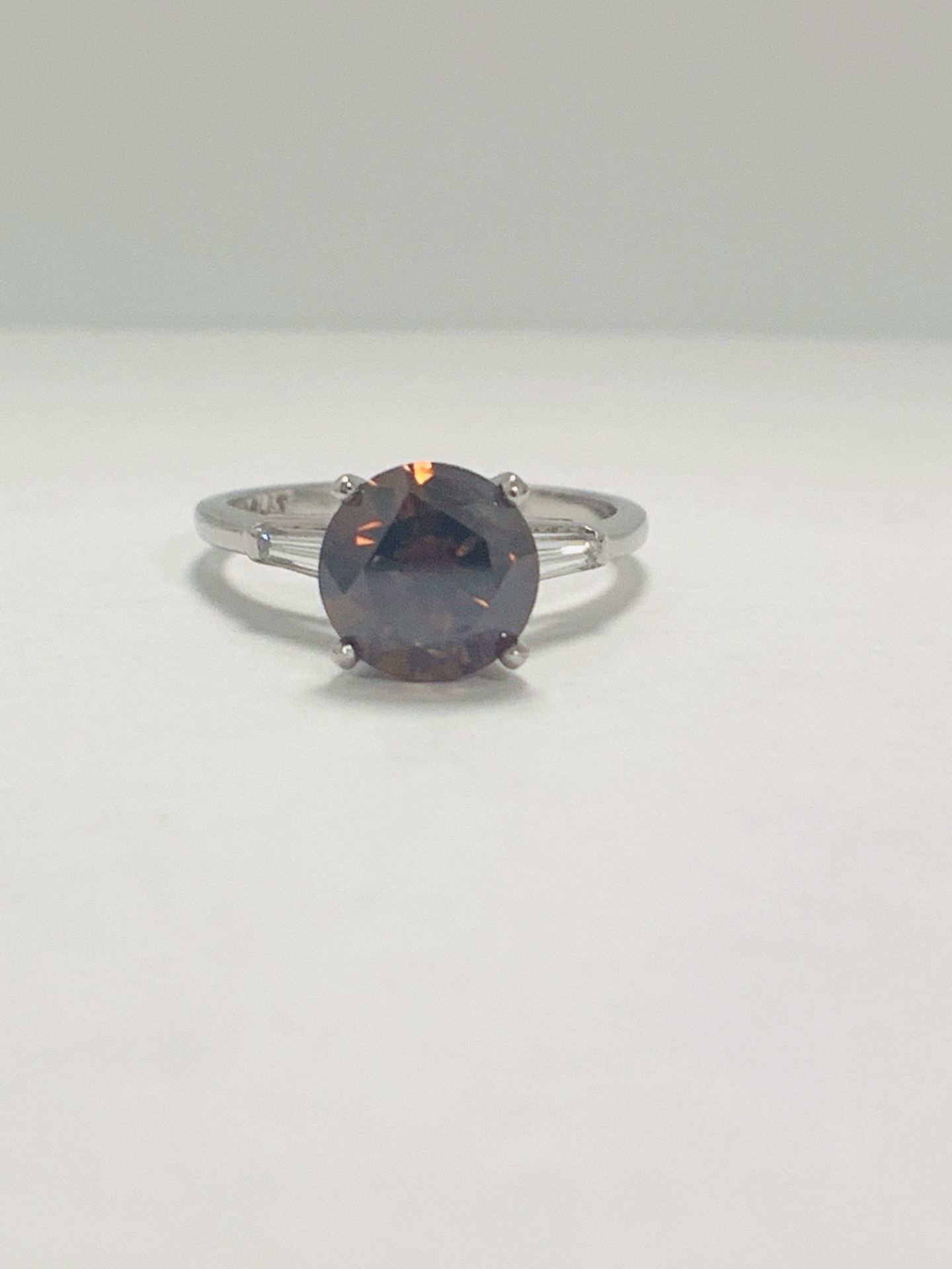 Platinum Diamond Ring Featuring Centre, Round Brilliant Cut, Deep Orangey Brown Diamond (2.15ct)