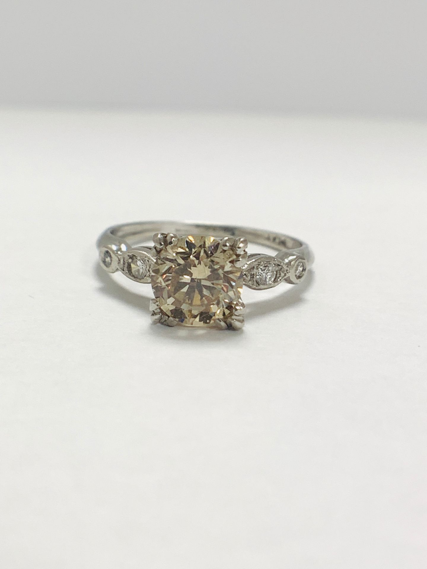 Platinum Diamond ring featuring centre, round brilliant cut, fancy light brown Diamond (1.55ct) - Image 9 of 14