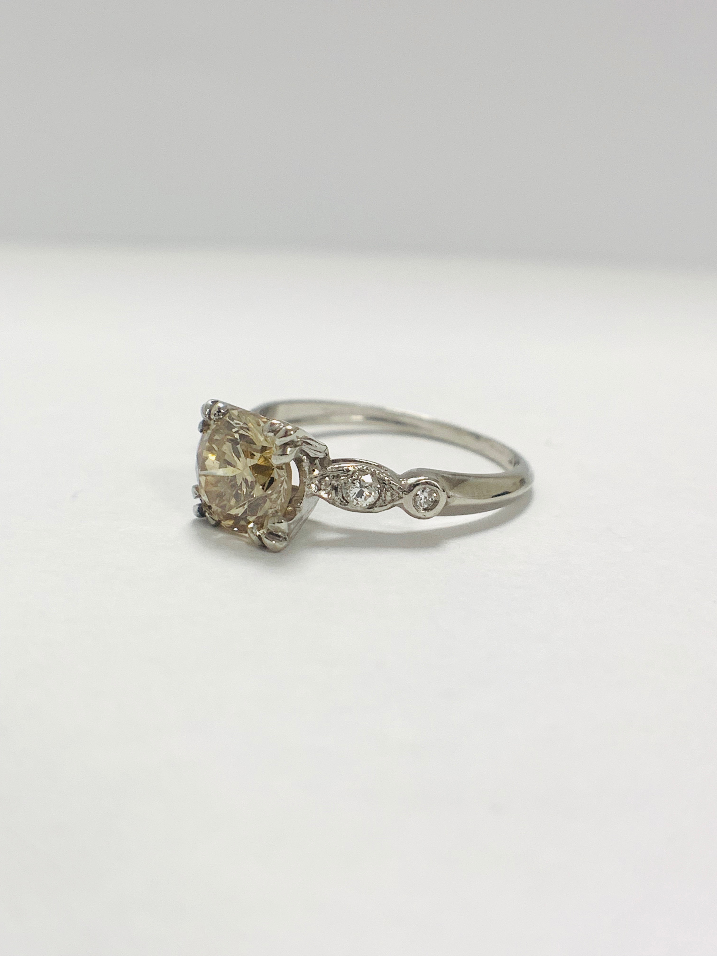 Platinum Diamond ring featuring centre, round brilliant cut, fancy light brown Diamond (1.55ct) - Image 2 of 14